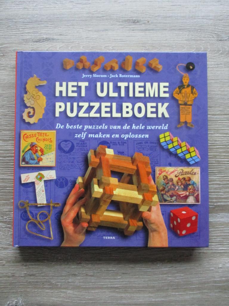 Het ultieme puzzelboek - Jerry Slocum / Jack Botermans, Boeken, Ophalen of Verzenden, Gelezen, Overige onderwerpen