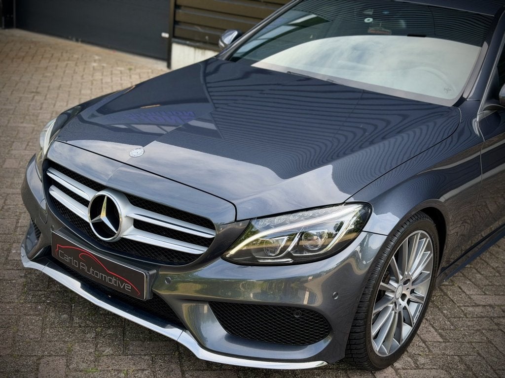 Mercedes-Benz C-Klasse 200 AMG AUT|LEER|MEMORY|CAMERA|KEYLES, Auto's, Mercedes-Benz, Automaat, 730 kg, 4 cilinders, 184 pk