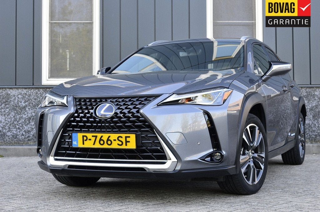 Lexus UX 250h Preference Line Rijklaarprijs-Garantie Apple/A, Auto's, Lexus, 12 maanden, 4 cilinders, Alcantara, Bedrijf