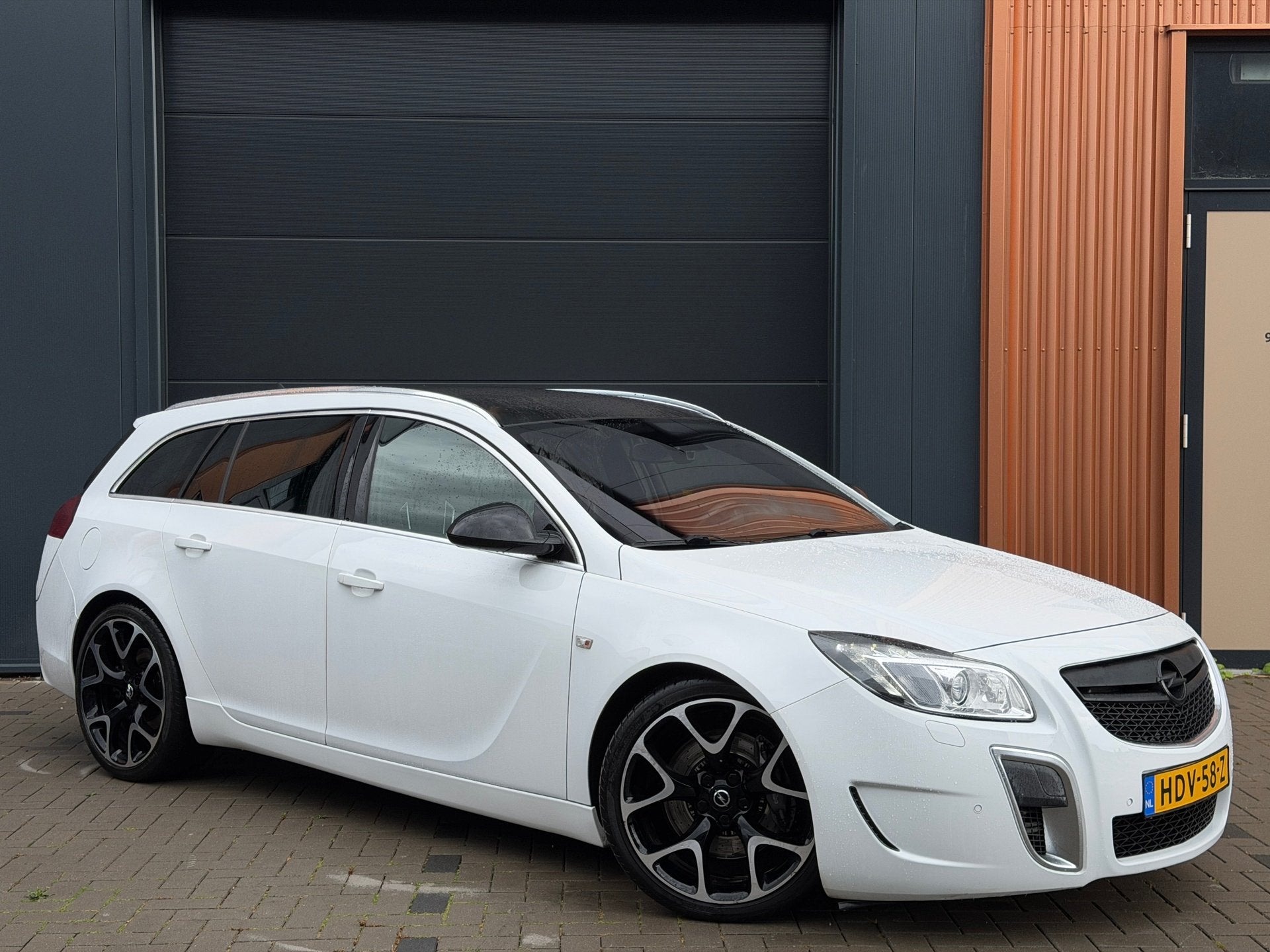 Opel Insignia Sports Tourer 2.8 T OPC 4x4|Smetteloze Staat!|, Auto's, Opel, Euro 5, Gebruikt, Zwart, Wit