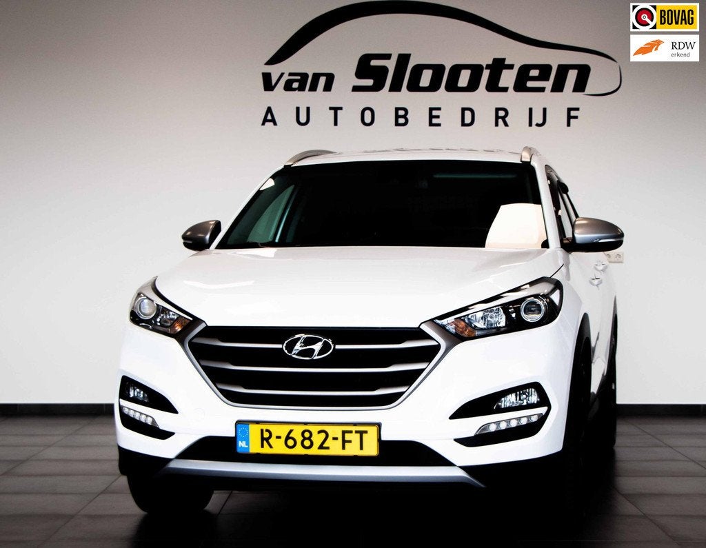 Hyundai Tucson 1.6 T-GDi Comfort 4WD| Navi| Camera| Cruise|, Auto's, Hyundai, Stof, Gebruikt, 4 cilinders, Wit