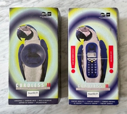 Design telefoon Swatch Toxic Rosella gifgroen in doos, Ophalen of Verzenden, Gebruikt, 1 handset
