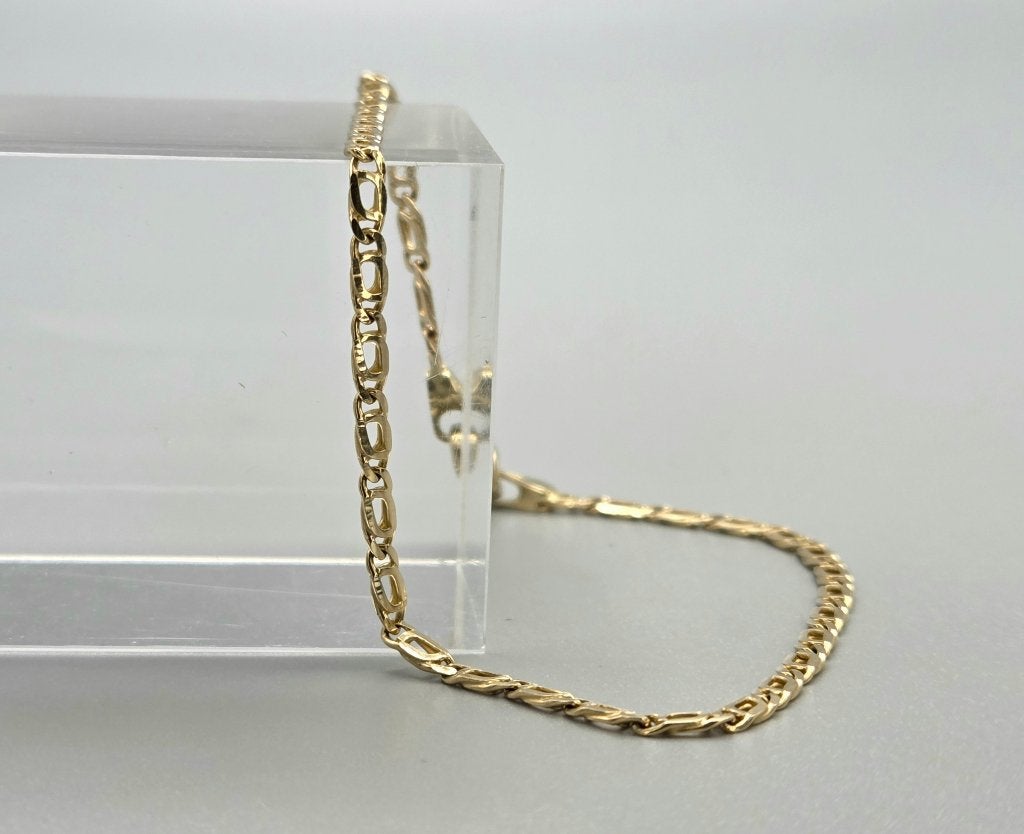 Vintage gouden valkenoog schakel armband. 2026/582