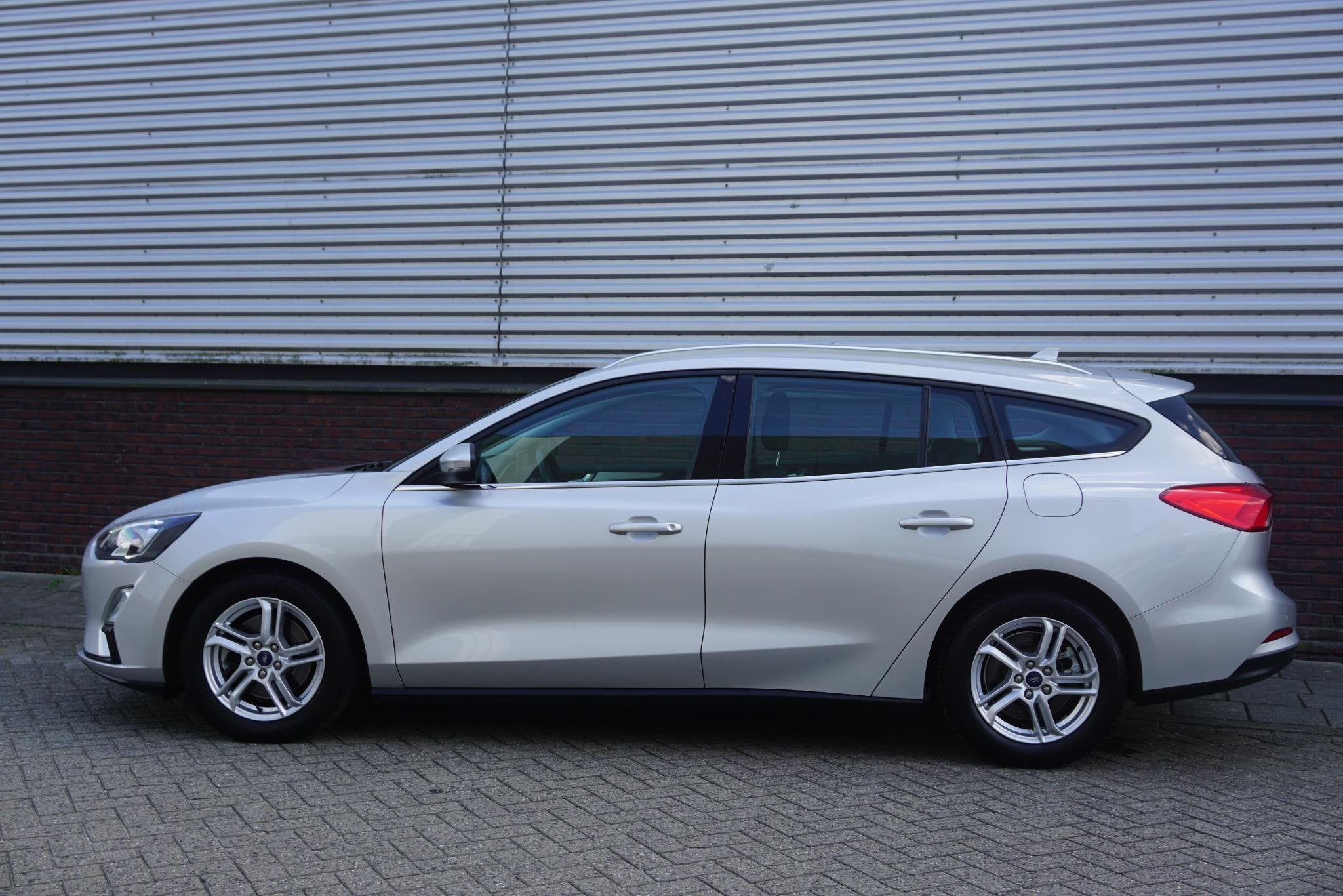 Ford Focus Wagon 1.0 EcoB.125PK Hybrid Business/AGR-Comforts, Gebruikt, Origineel Nederlands, Zilver of Grijs, 999 cc