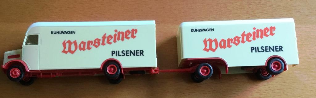 ALBEDO 1:87 MAN  GELEDE VRACHTWAGEN - WARSTEINER PILSENER, Hobby en Vrije tijd, Modelauto's | 1:87, Ophalen of Verzenden, Zo goed als nieuw