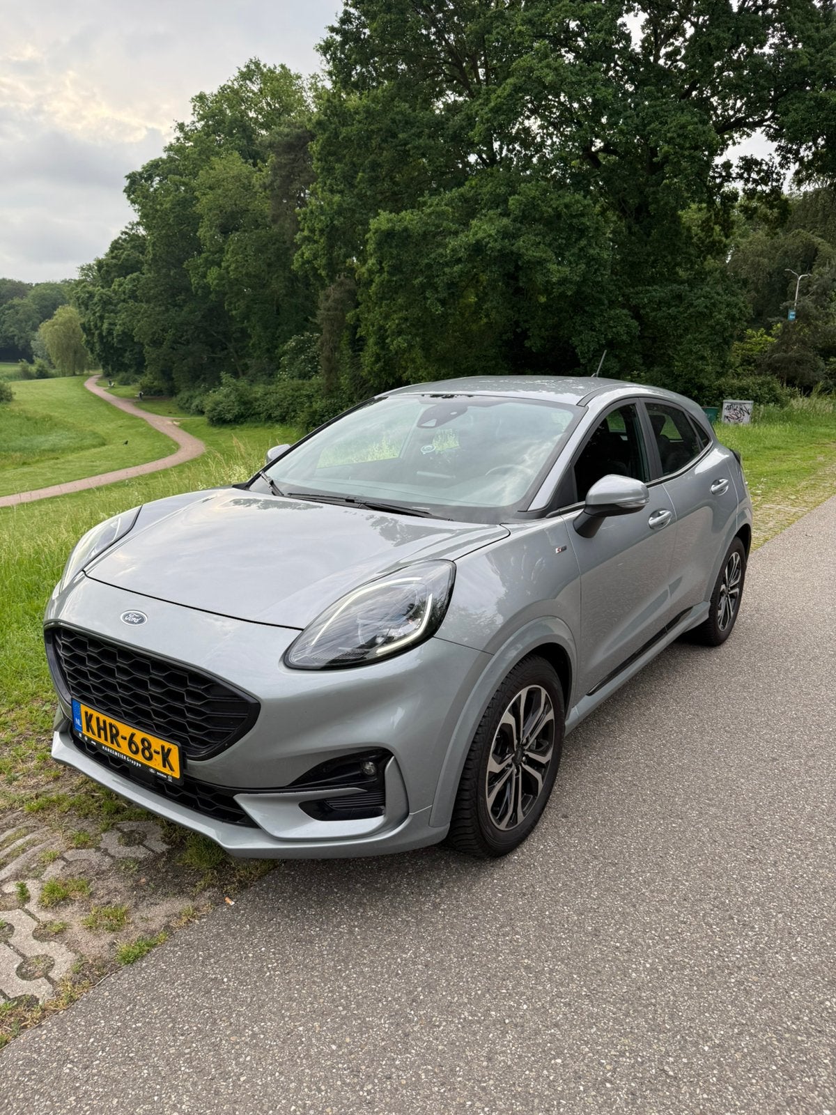 Ford Puma ST line 1.0i Ecoboost Hybrid 125pk 2023 Grijs, Auto's, Puma, 1288 kg, 123 pk, Handgeschakeld