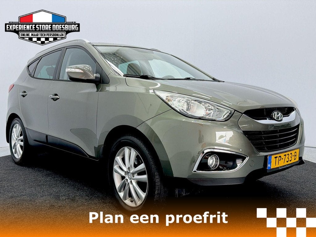 Hyundai ix35 2.0i Business Edition Ruime SUV met sterke moto, Auto's, Gebruikt, Automatische klimaatregeling, 4 cilinders, Met garantie (alle)