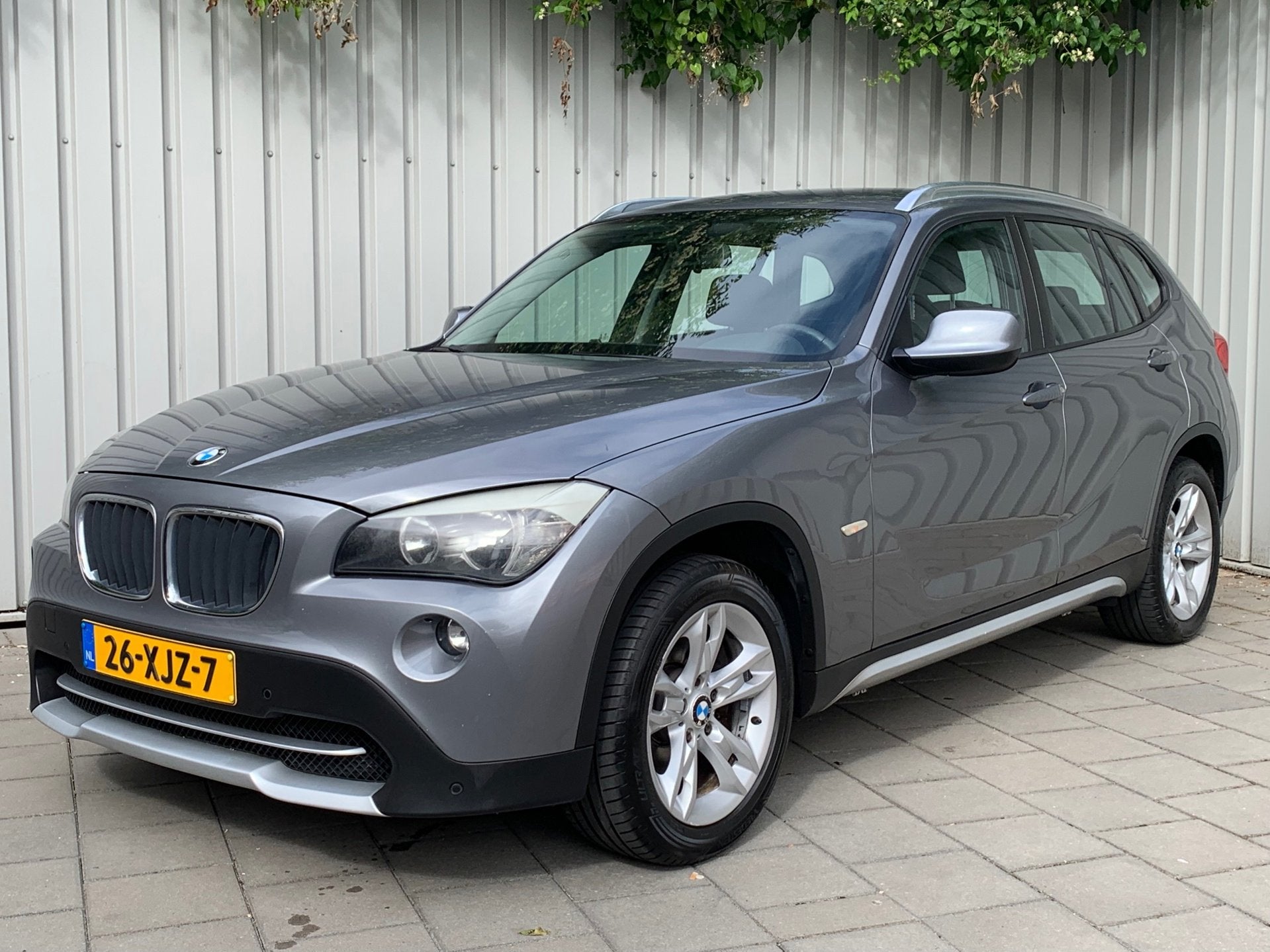 BMW X1 SDrive20i Business|Navigatie|Climate Control|, X1, Zwart, 4 cilinders, Bedrijf
