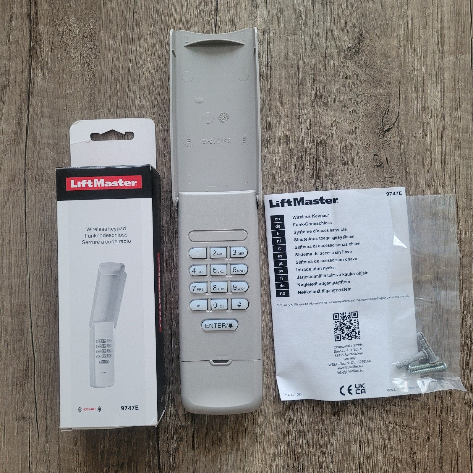 LiftMaster 9747E Draadloos Toetsenpaneel Garagedeur, Draadloos, Ophalen of Verzenden, Zo goed als nieuw, Compleet systeem