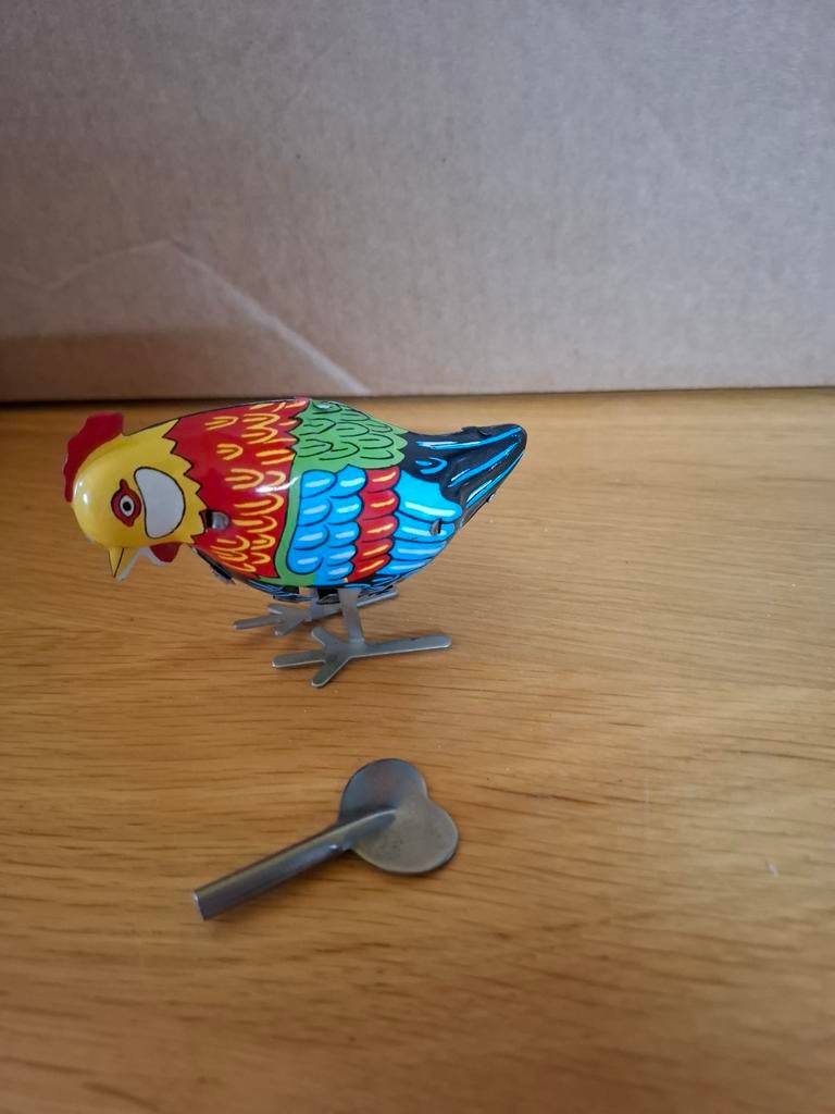 Blikken vogel met opwindsleutel, Verzamelen, Speelgoed, Ophalen of Verzenden