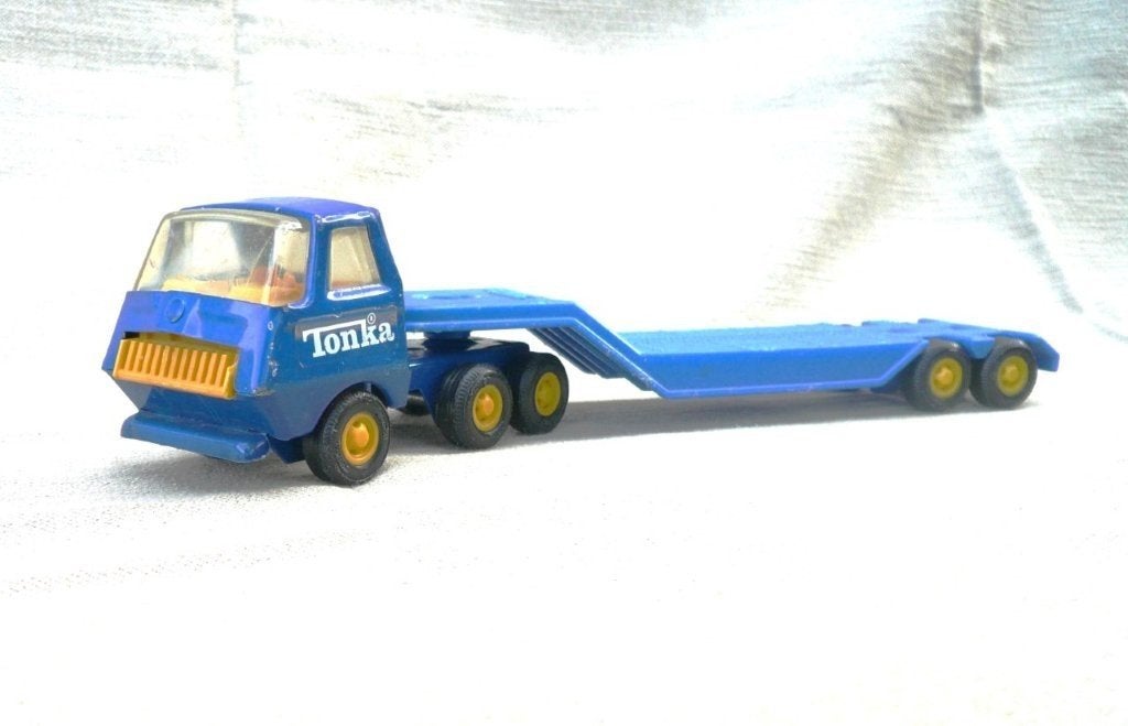 Tonka Canada 6x4 trekker met dieplader oplegger. 1/40., Ophalen of Verzenden