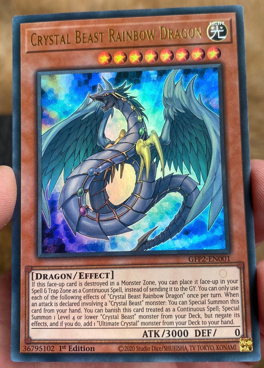Yu-Gi-Oh! Crystal Beast Rainbow Dragon GFP2 1st Edition !, Ophalen of Verzenden, Zo goed als nieuw, Losse kaart, Foil