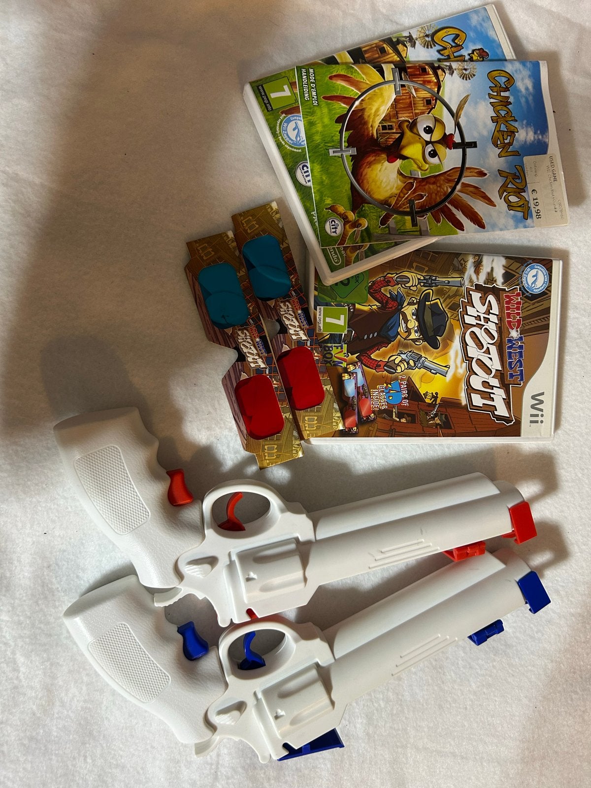 Wii games met pistolen en 3D-brillen - Chicken Riot & Wild W, Ophalen of Verzenden, Zo goed als nieuw, Met 2 controllers, Met games