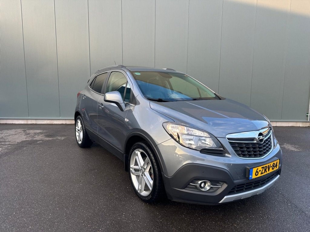 Opel Mokka 1.4 T Cosmo LEDER | OPEN DAK | ONDERHOUDSBOEKJE !, Auto's, Voorwielaandrijving, Euro 5, 4 cilinders, Origineel Nederlands