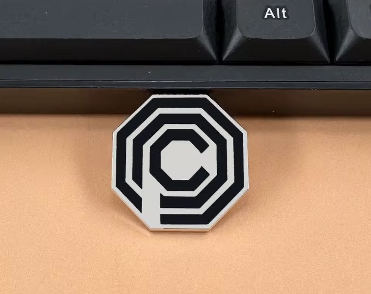 OCP Metalen Pin Uit De Cultfilm RoboCop (Nieuw), Verzamelen, Ophalen of Verzenden, Nieuw, Merk, Speldje of Pin