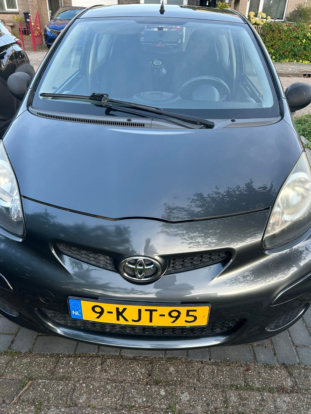 Toyota Aygo 1.0 12V Access  2011 Grijs 99.350km, Auto's, Voorwielaandrijving, 4 stoelen, 68 pk, Handgeschakeld