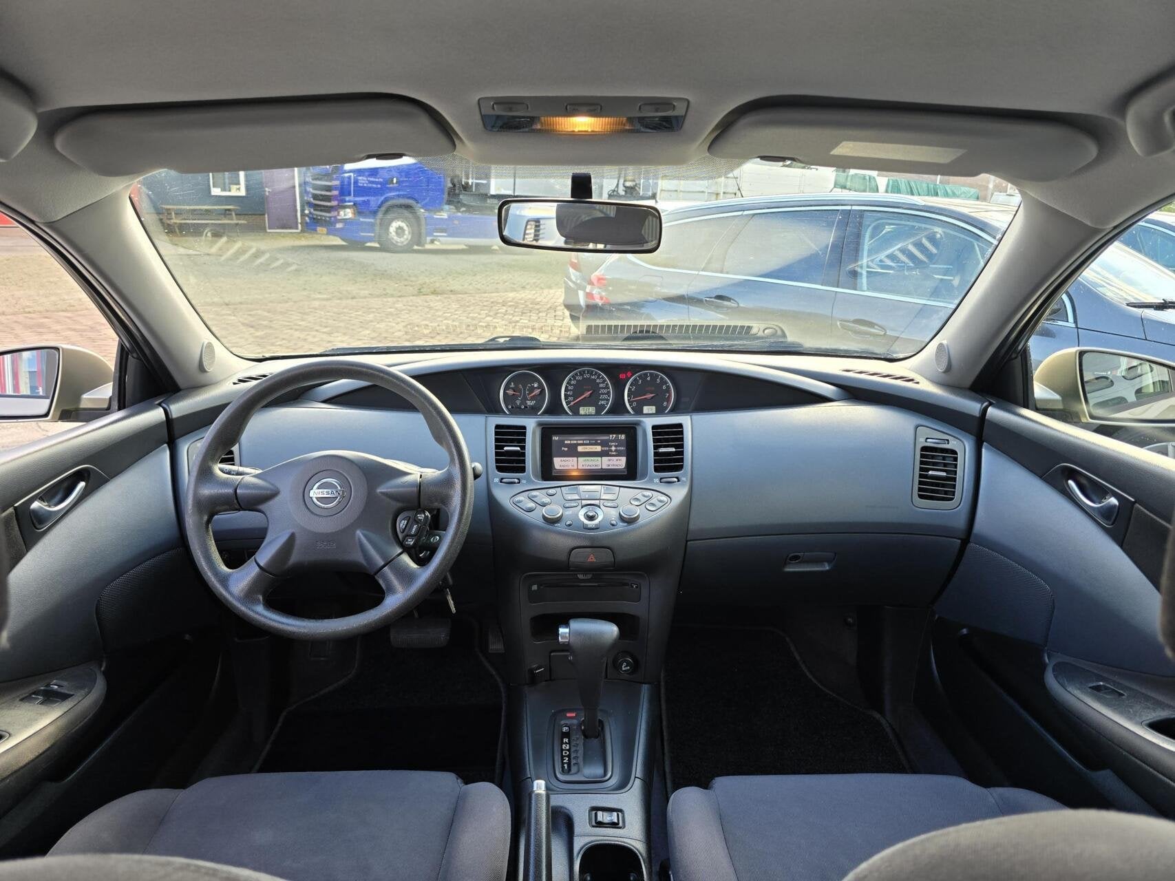 Nissan Primera Estate 1.8 Visia Automaat Navi/Cruise/Clima, Auto's, Stof, Gebruikt, 4 cilinders, 700 kg