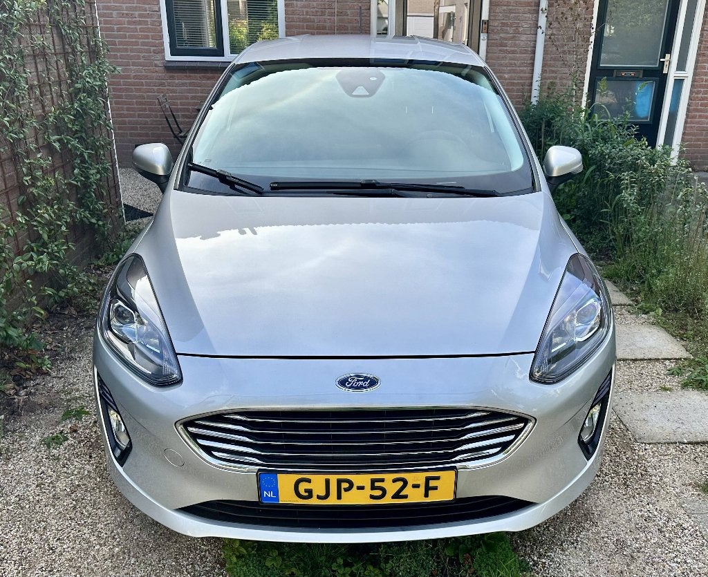 Ford Fiesta 1.0 EcoBoost 100pk Titanium 2021 - Nieuwe banden, Voorwielaandrijving, Leder en Stof, Lichtsensor, Handgeschakeld