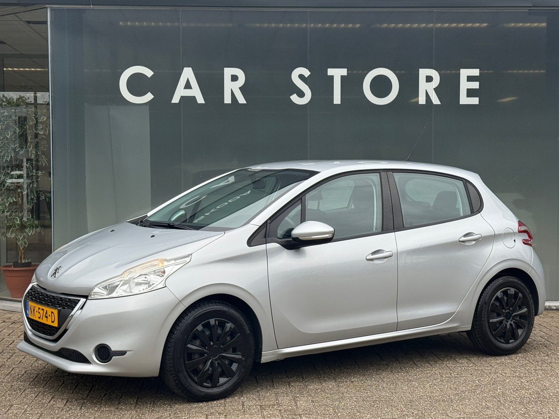 Peugeot 208 1.2 VTi Allure Navi Stoelverwarming Airco, Voorwielaandrijving, Euro 5, Stof, Gebruikt