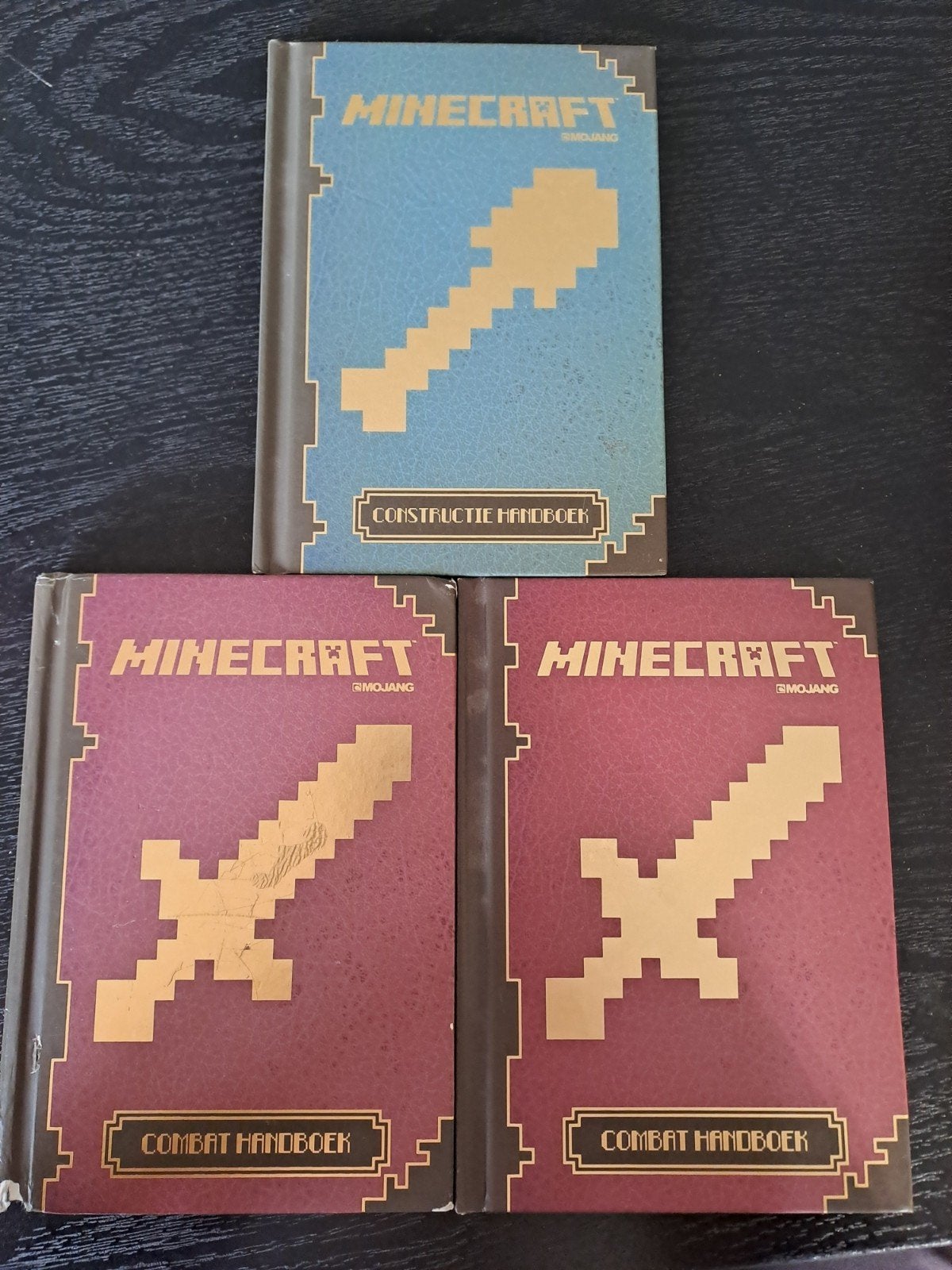 Minecraft Handboeken: Constructie en Combat (3 stuks), Ophalen of Verzenden, Gelezen, Mojang