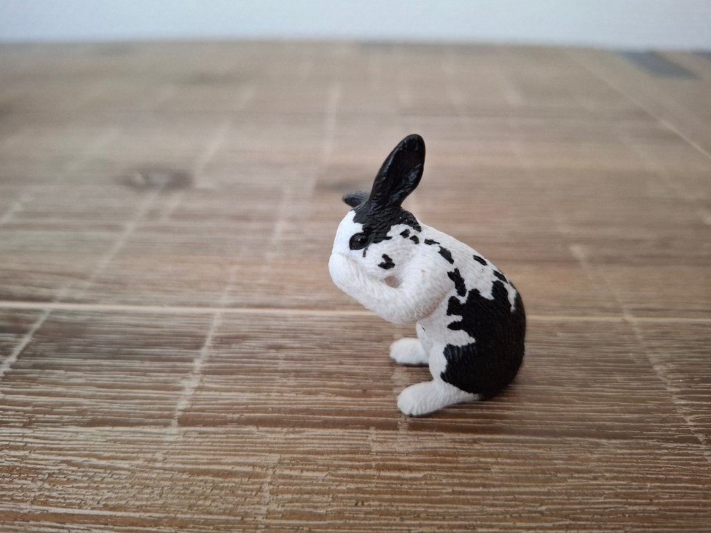 Schleich 13698 zittend wassend zwart/wit konijn, Ophalen of Verzenden, Zo goed als nieuw