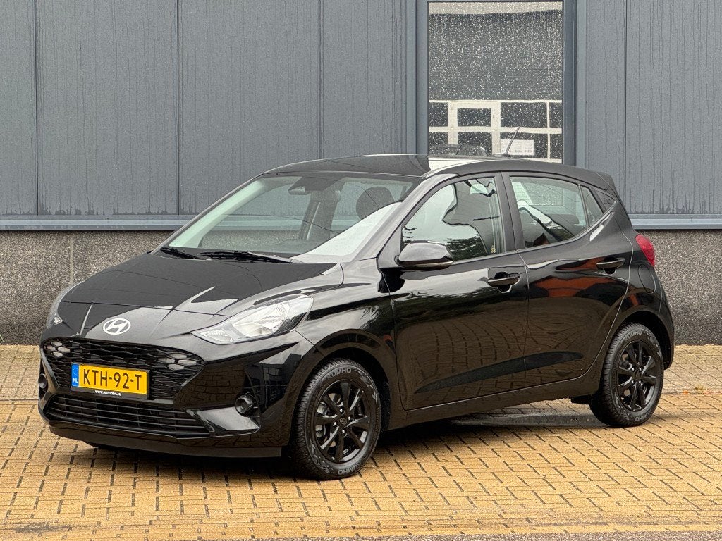 Hyundai i10 1.2 57KW Comfort Aut Navi, Clima (bj 2024), 12 maanden, Stof, Gebruikt, 4 cilinders