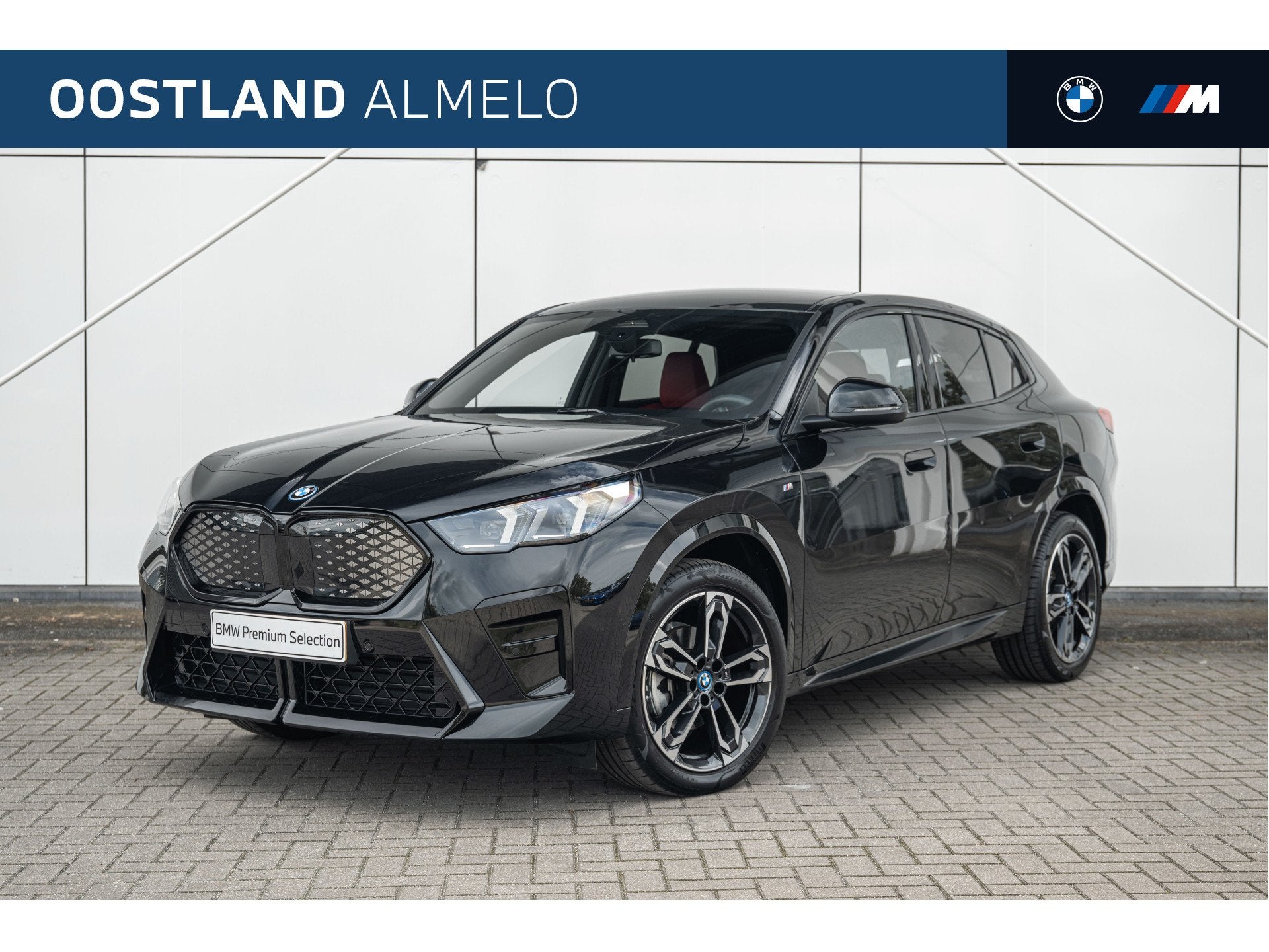 BMW iX2 eDrive20 M Sport / Sportstoelen / Achteruitrijcamera, 478 km, 750 kg, Met garantie (alle), 24 min