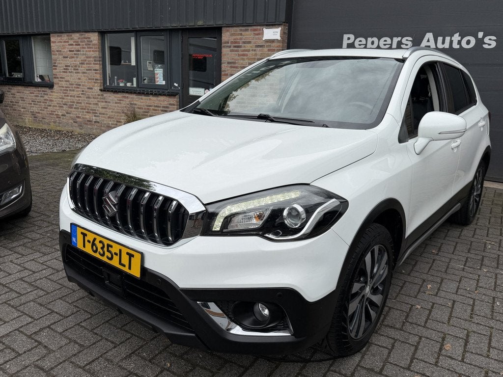 Suzuki S-Cross 1.4 Boosterjet Style Smart Hybrid appele carp, Auto's, Gebruikt, Euro 6, Wit, Leder