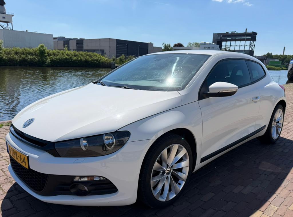Volkswagen Scirocco 1.4 TSI | Apk 28-06-2027 | Cruise | Navi, Auto's, Voorwielaandrijving, Zwart, 4 cilinders, Parkeersensor