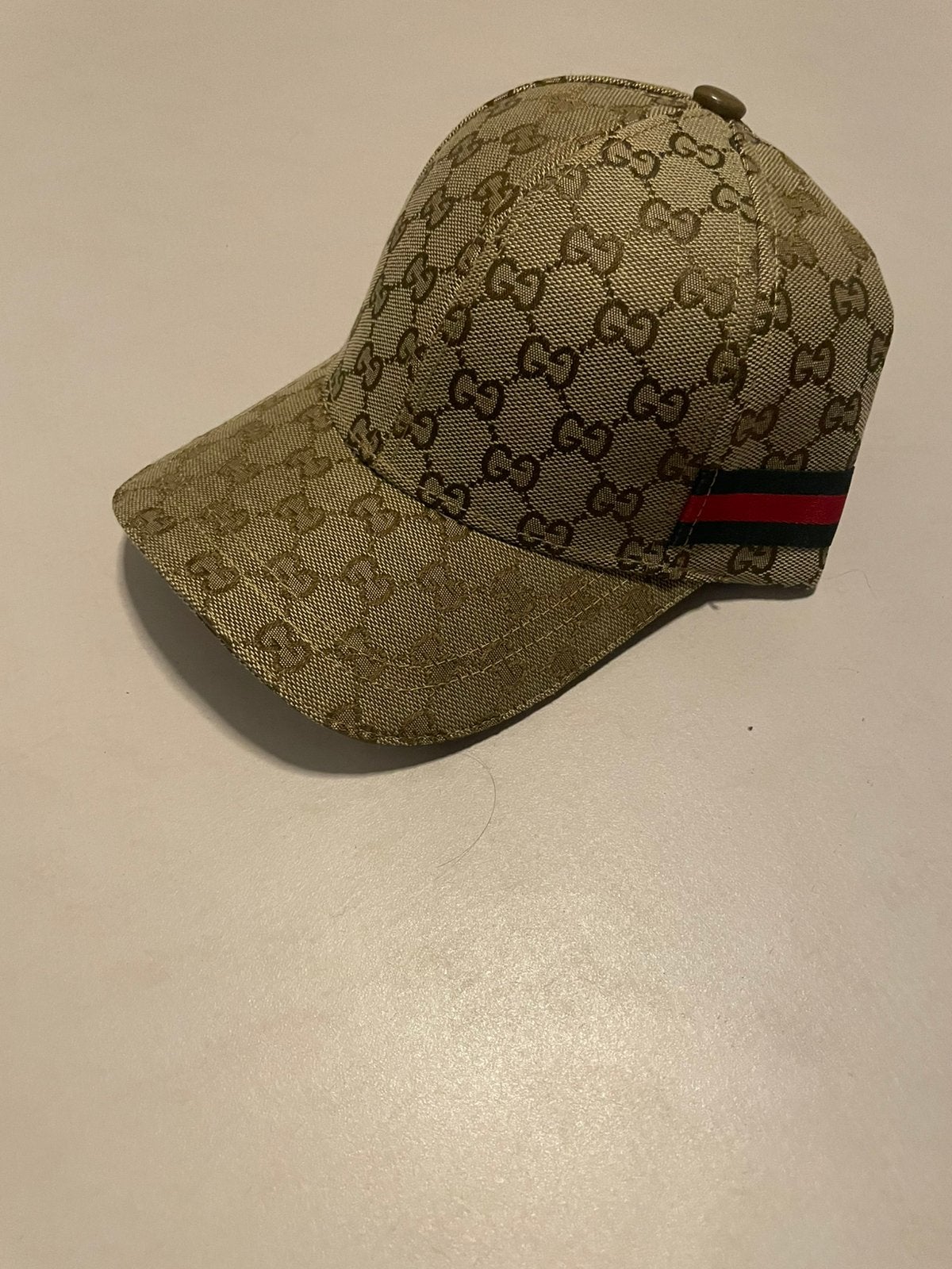 Bruine Gucci pet, Verzenden, Zo goed als nieuw