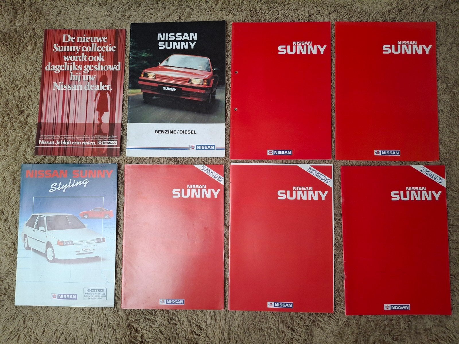 Lot autofolders Nissan Sunny B12, Verzenden, Nissan