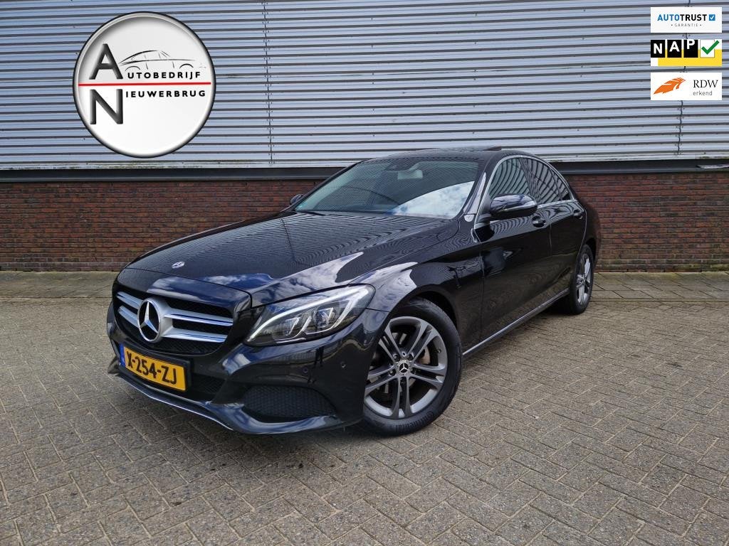 Mercedes-Benz C-klasse 180 Premium Plus Ambient - Cruise - N, Auto's, Automaat, Met garantie (alle), Leder en Stof, Zwart
