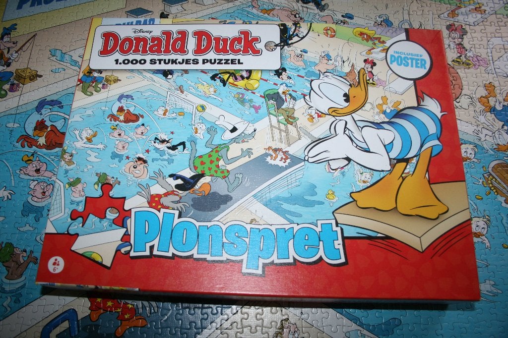 Legpuzzel Donald - Plonspret - 1000 st, Ophalen of Verzenden, 500 t/m 1500 stukjes, Zo goed als nieuw