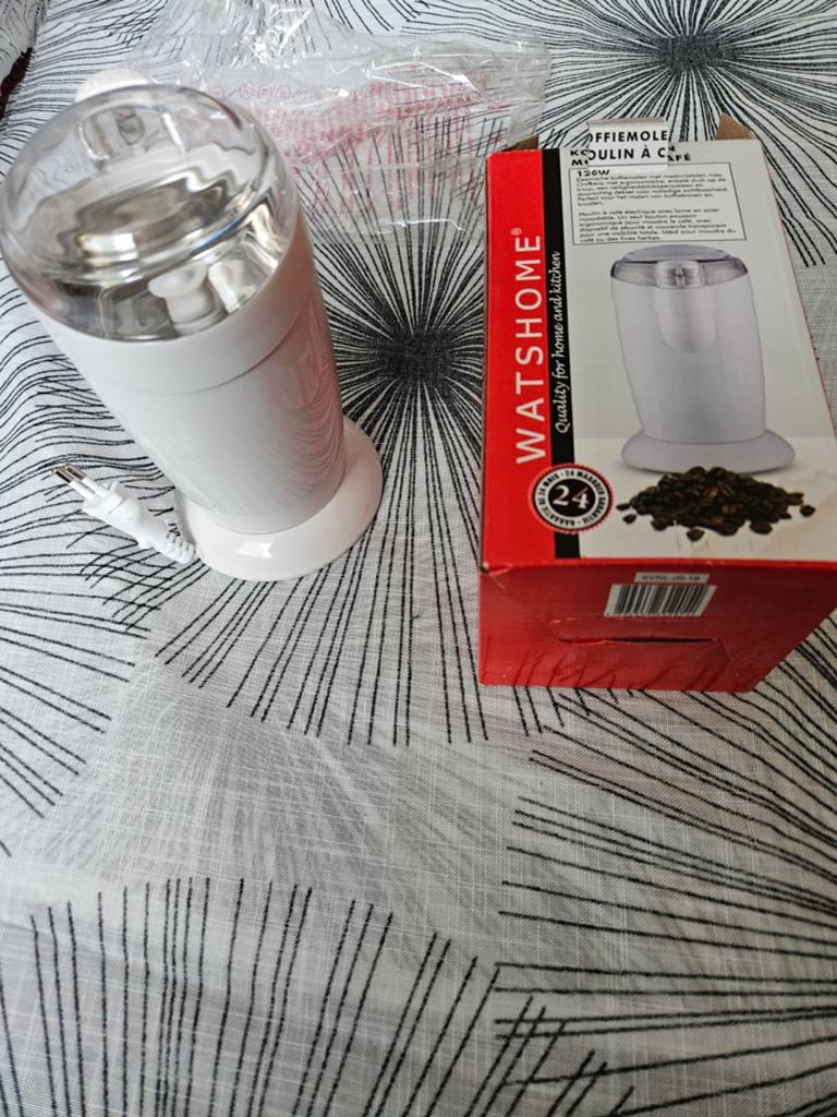 Mooi en werkende en nieuwe koffiemolen, Ophalen