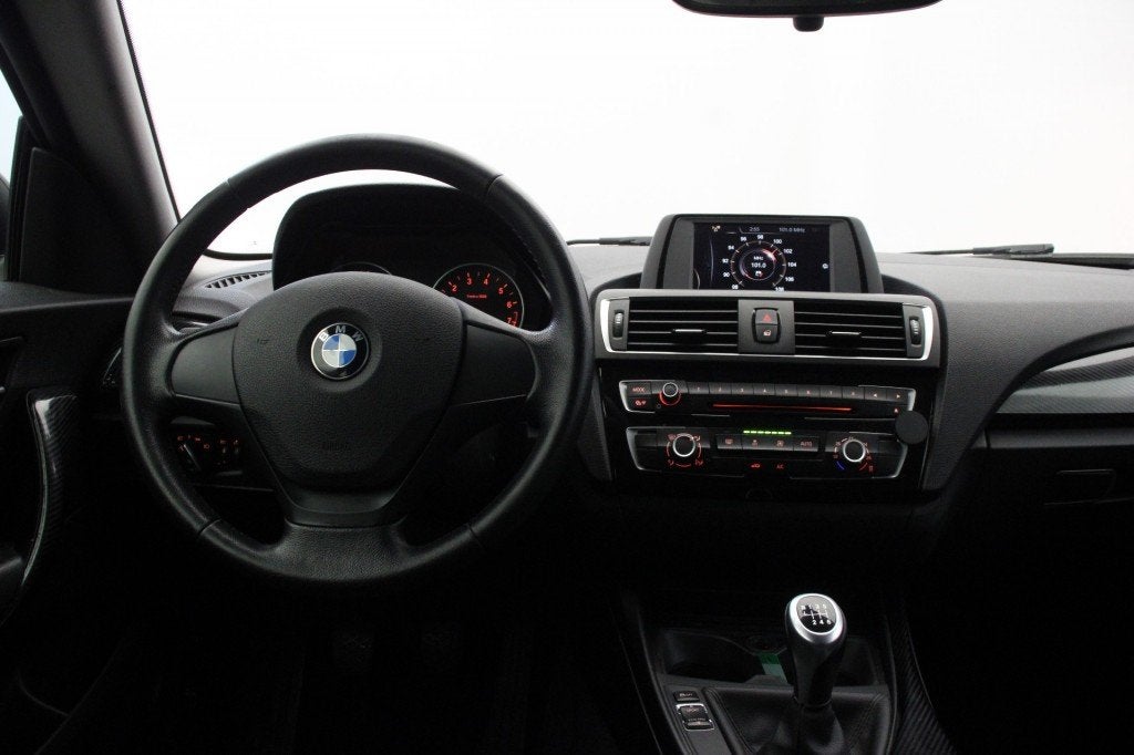 Bmw 1-SERIE 116i - Airco, Cruise, 1-Serie, Achterwielaandrijving, Met garantie (alle), 4 stoelen