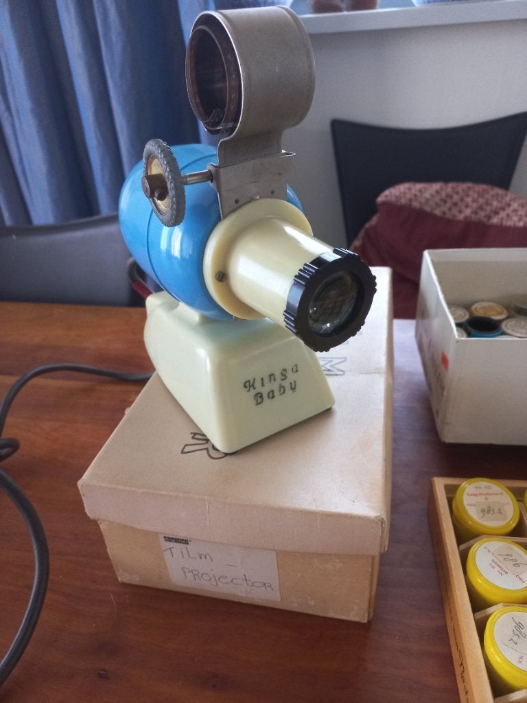 Antiek speelgoed kinsa baby projector vintage, Antiek en Kunst, Antiek | Speelgoed, Ophalen of Verzenden