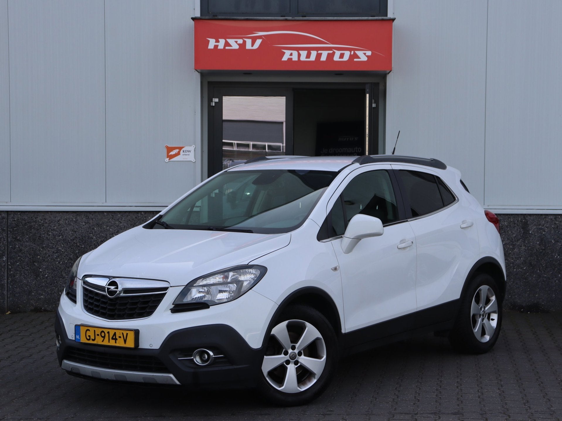 Opel Mokka 1.4 T Cosmo LPG navi 1/2 Leer airco org NL, Auto's, Voorwielaandrijving, Gebruikt, Euro 6, Wit