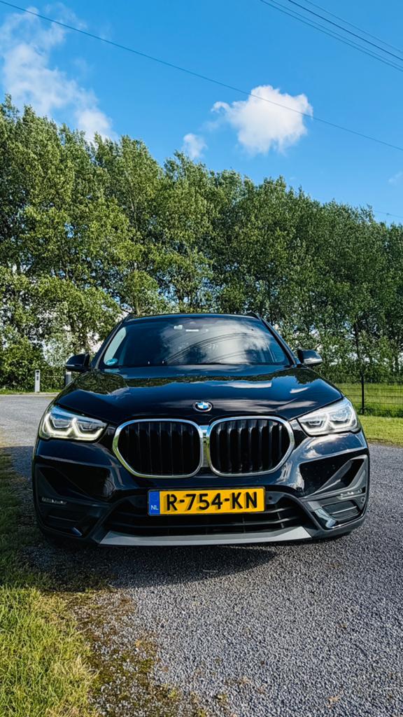 BMW X1 Xdrive25e 220pk Aut 2021 Zwart, Auto's, 125 pk, 750 kg, Zwart, Plug-in hybride
