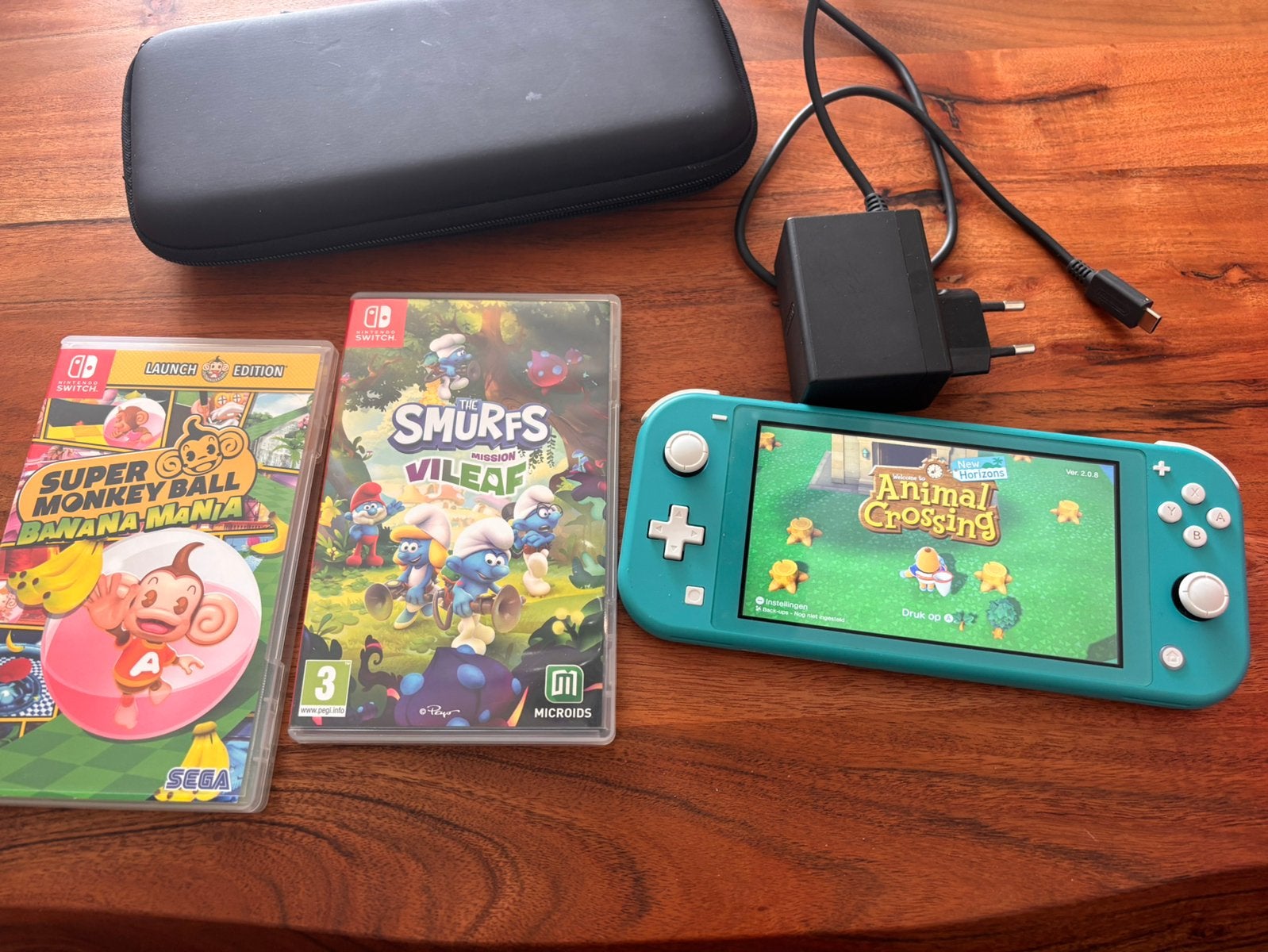 Nintendo Switch Lite Turquoise (Nette Staat) met 3 spellen, Ophalen of Verzenden, Turquoise, Zo goed als nieuw