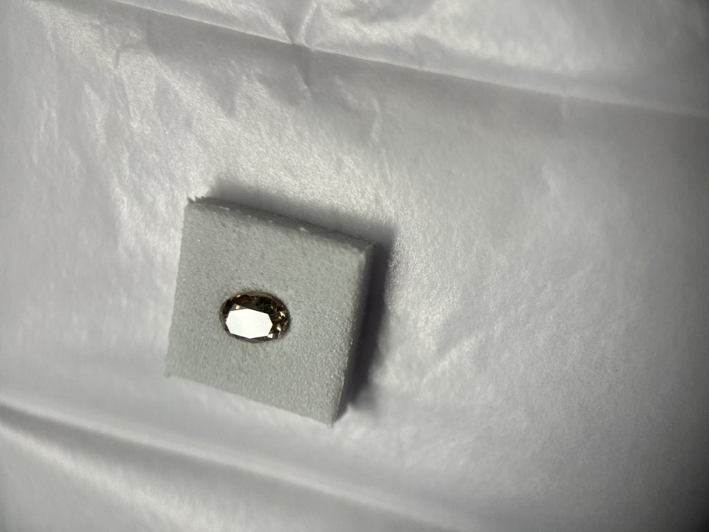 Oval modified Brilliant 0,65ct fancy brown (67), Ophalen of Verzenden, Zo goed als nieuw