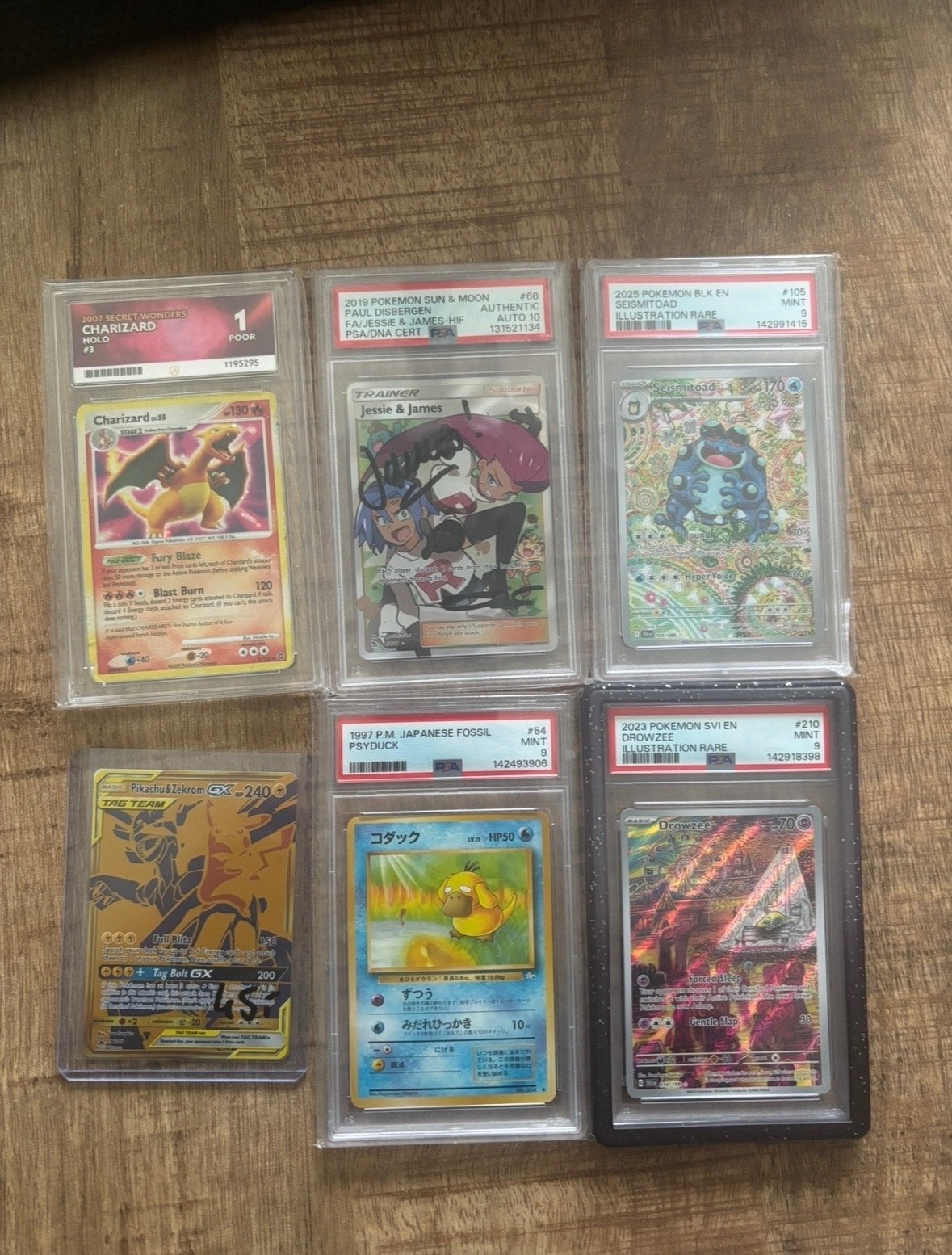 Pokémon Kaarten Collectie - Graded Charizard, Jessie & James, Ophalen of Verzenden, Gebruikt, Meerdere kaarten