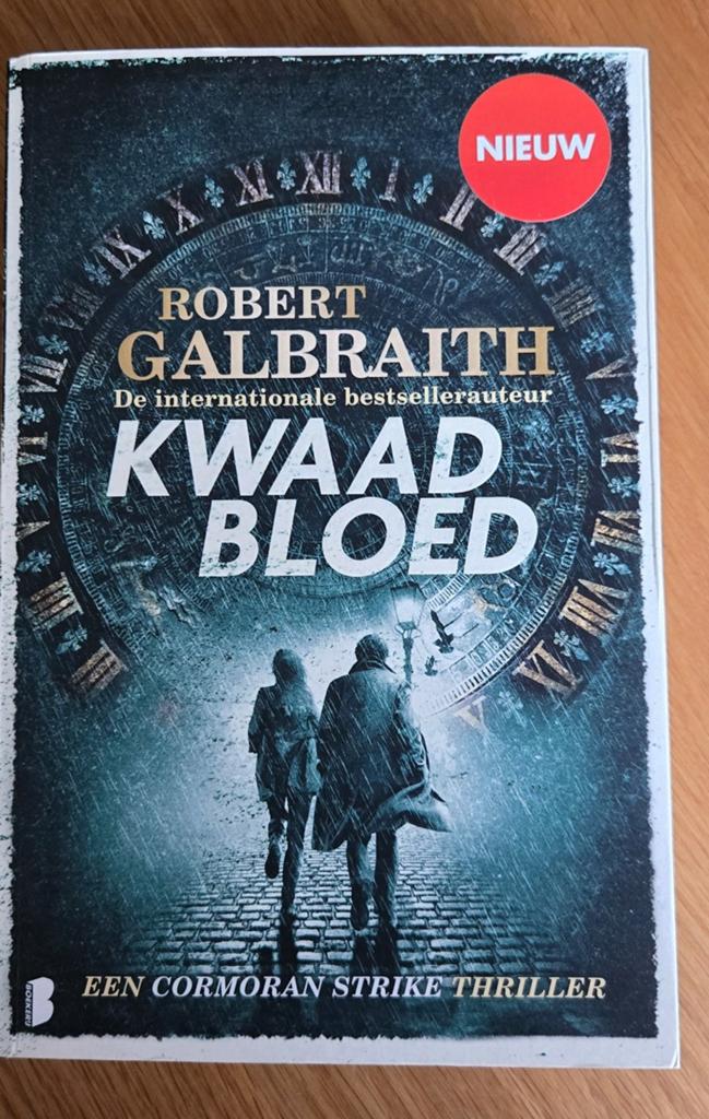 Robert Galbraith - Kwaad bloed, Boeken, Thrillers, Zo goed als nieuw, Ophalen of Verzenden