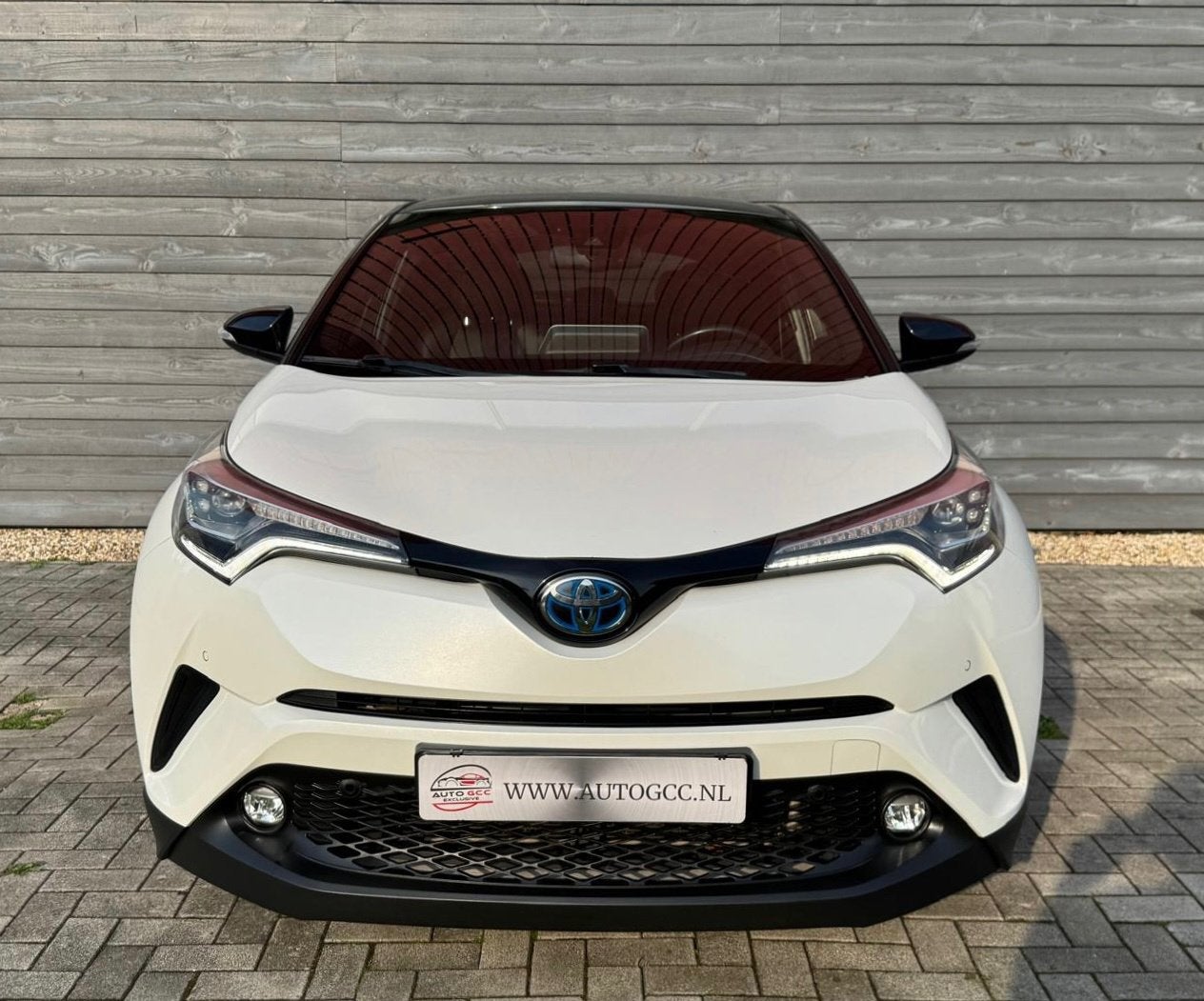 Toyota C-HR 1.8 HYBRID STYLE ULTIMATE NAVI LEDER CAMERA NAP, Auto's, 4 cilinders, Wit, 26 km/l, Hybride Elektrisch/Benzine
