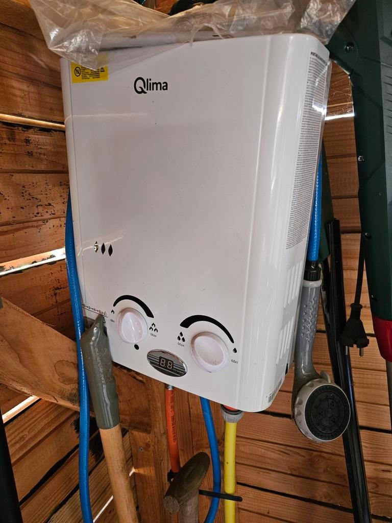 Qlima PGWH1010 Geiser Propaan/Butaan - Nieuwstaat, Geiser, Ophalen of Verzenden, Minder dan 20 liter, Propaan of Butaan