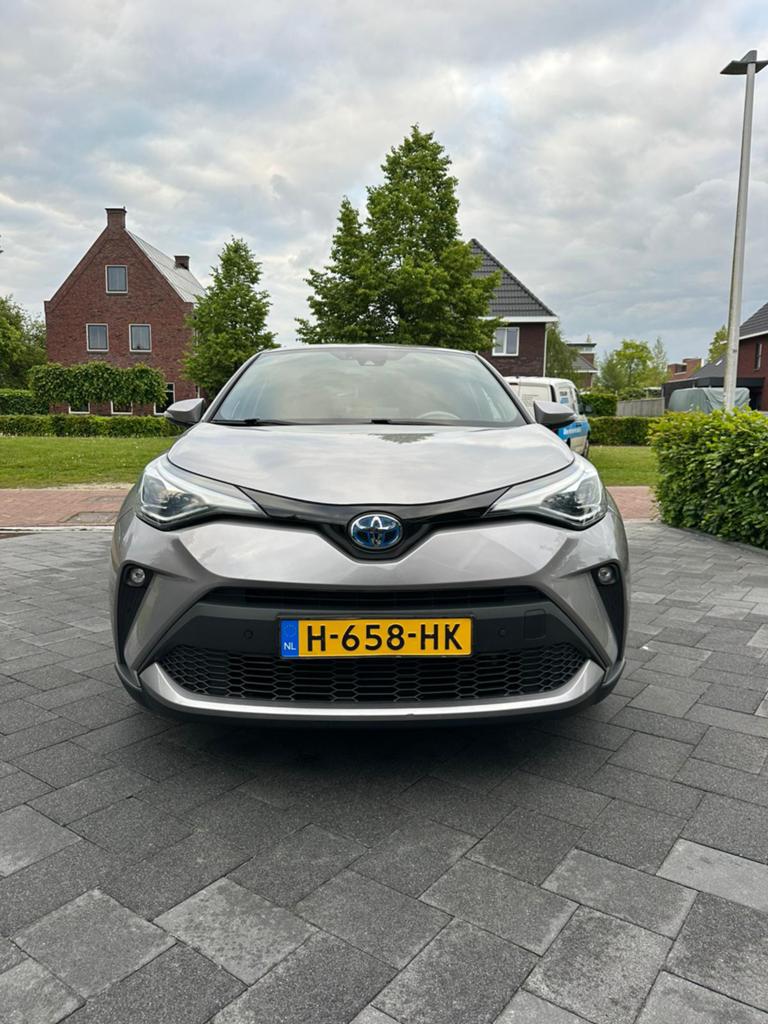 Toyota C-HR 1.8 Hybrid 122pk CVT 2020 Grijs, Auto's, Toyota, 725 kg, Euro 6, 4 cilinders, Leder en Stof