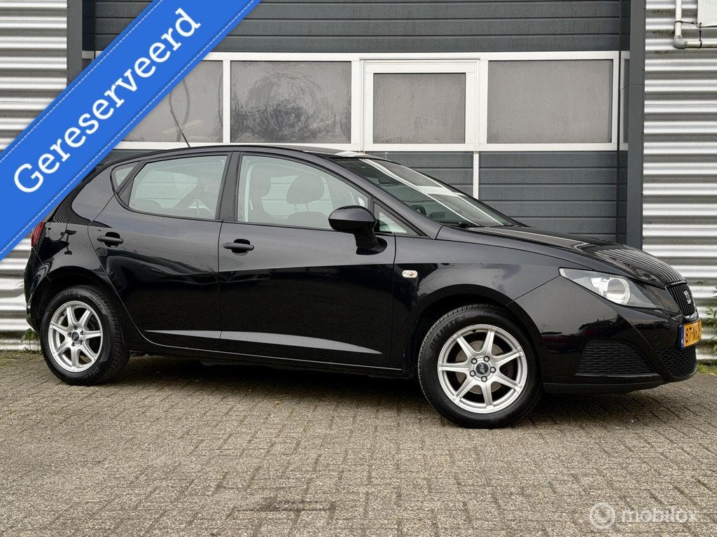 Seat Ibiza 1.2 Club 2010 5 Deurs|130.000 NAP|Bluetooth|Airco, Auto's, Voorwielaandrijving, Euro 5, Stof, Zwart