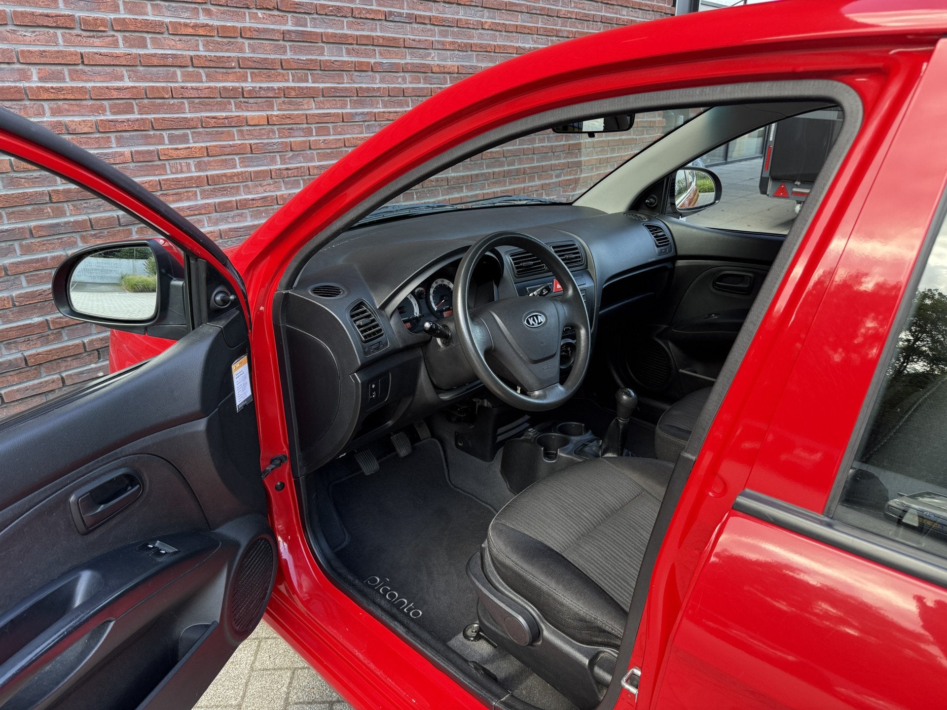 Kia Picanto 1.1 X-tra First Edition Airco 1e eigenaar! 70dkm, Auto's, Voorwielaandrijving, Stof, Zwart, 4 cilinders