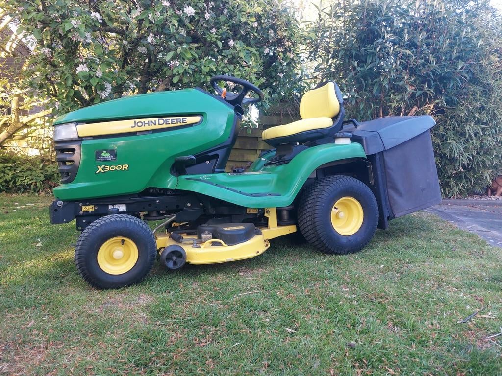 John deere x300r met opvangbak, Ophalen