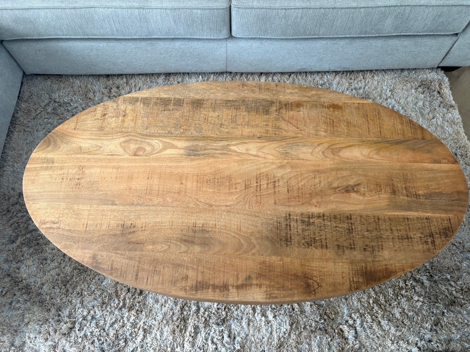 Ovale Salontafel van Mangohout met Zwart Metalen Onderstel, Huis en Inrichting, Ophalen, 100 tot 150 cm, 50 tot 100 cm, Zo goed als nieuw