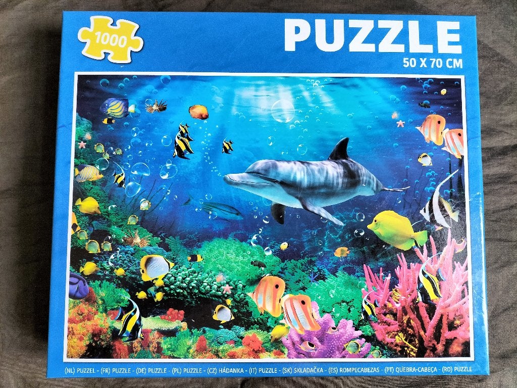 Puzzel Onderwaterwereld met Dolfijn ( 1000 stukjes ), Ophalen of Verzenden, 500 t/m 1500 stukjes, Zo goed als nieuw, Legpuzzel